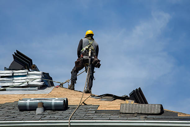 Professional Roof Replacement technician working in Valencia, CA